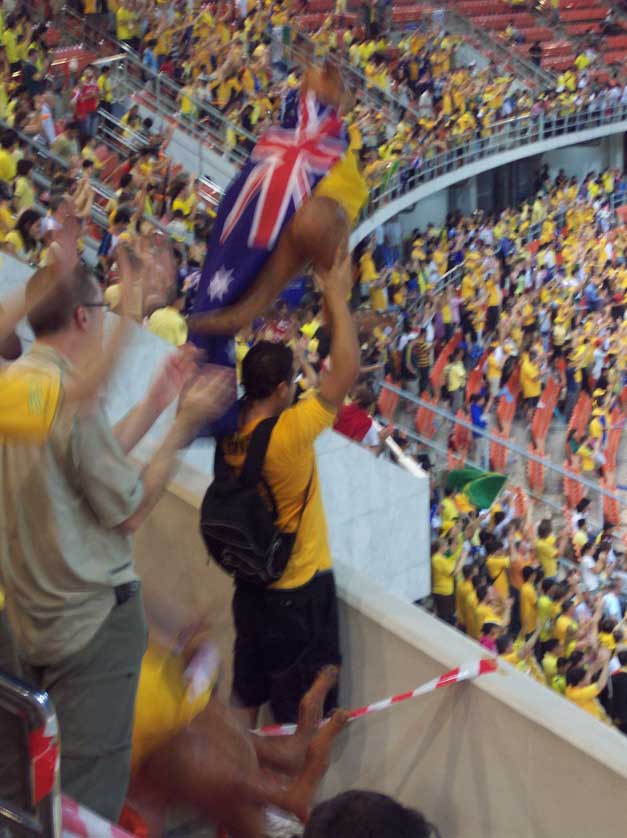 Aussie fans celebrate their team's win over Thailand in the 2007 Asian Cup.