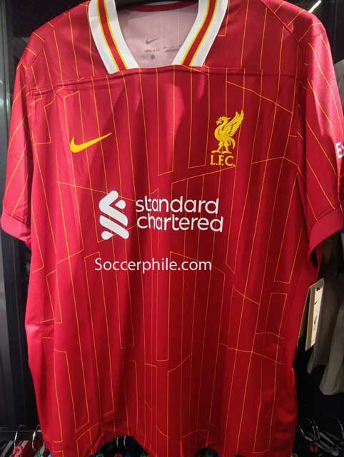 Liverpool FC shirt.