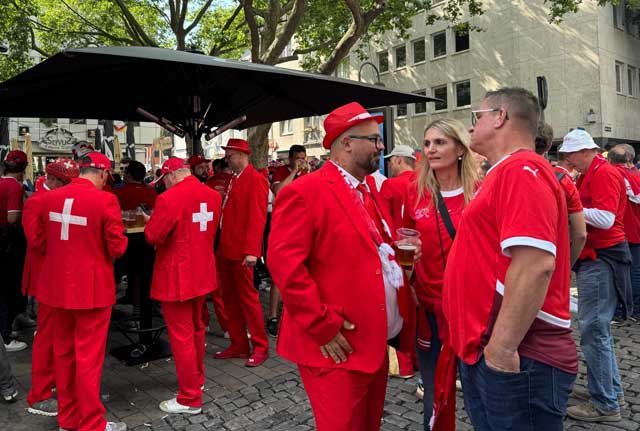 Swiss fans very smart in suits, Cologne Stadium, June 19.