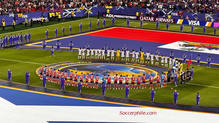 The teams line up.