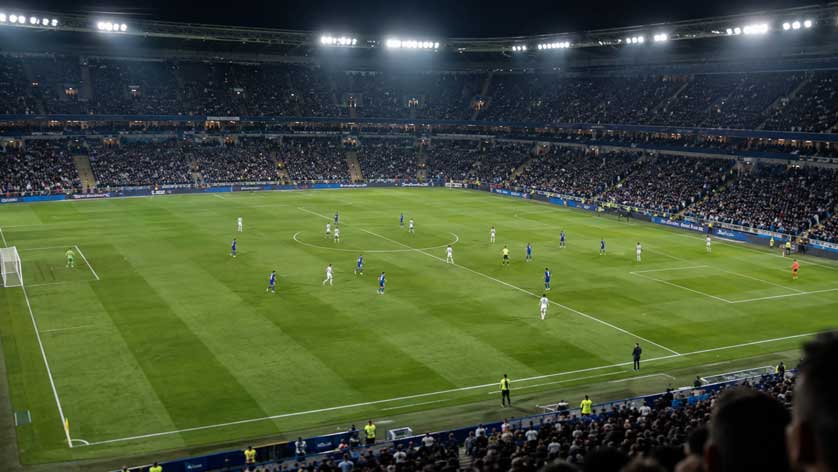 Football stadium during a professional match.