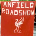 Anfield Road banner.