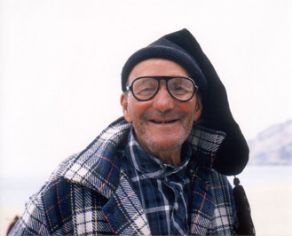Fisherman at Nazare wearing a traditional bonnet.